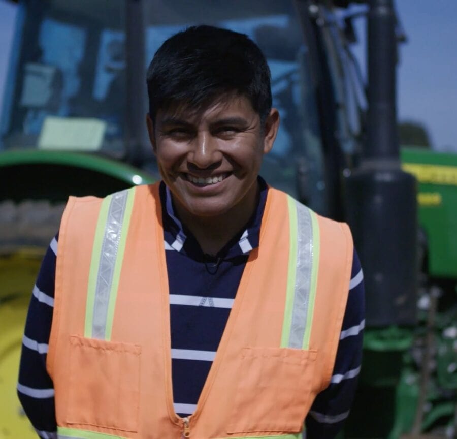 H-2A farmworker smiling in front of a tractor – advocacy video for Polaris on ethical labor practices