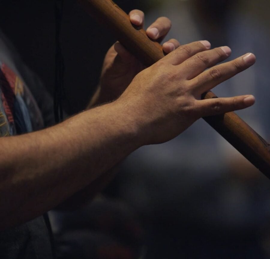 flute musician playing at the tribal energy evolution summit 2025